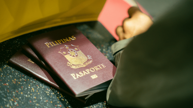Philippine passport beside car keys